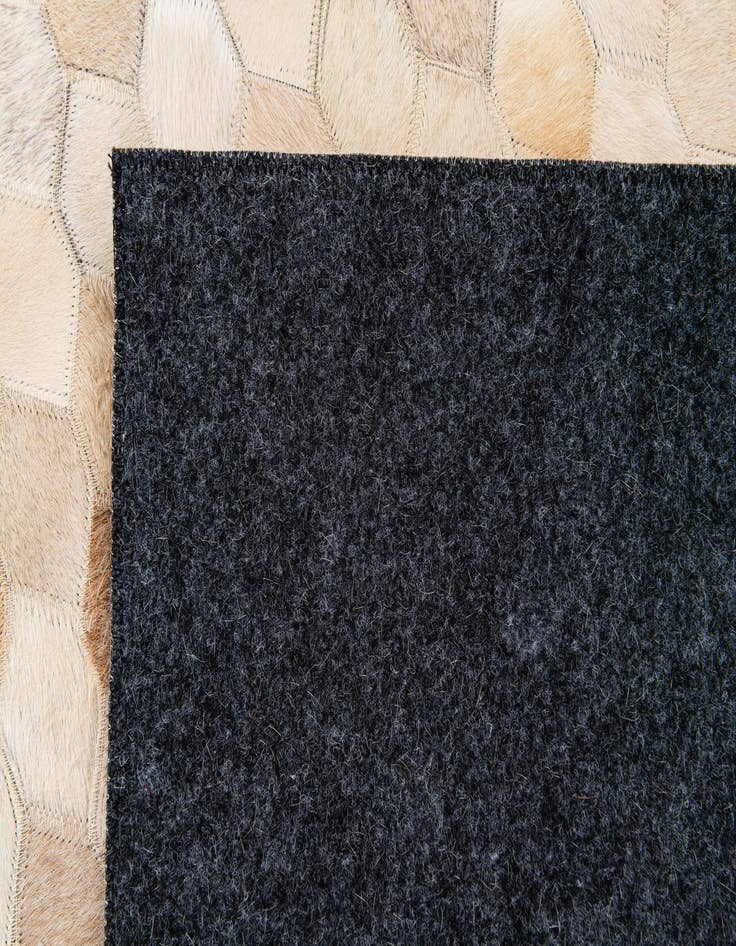 Detail image of  4' 9 x 6' 8 Cowhide Stocks Rug