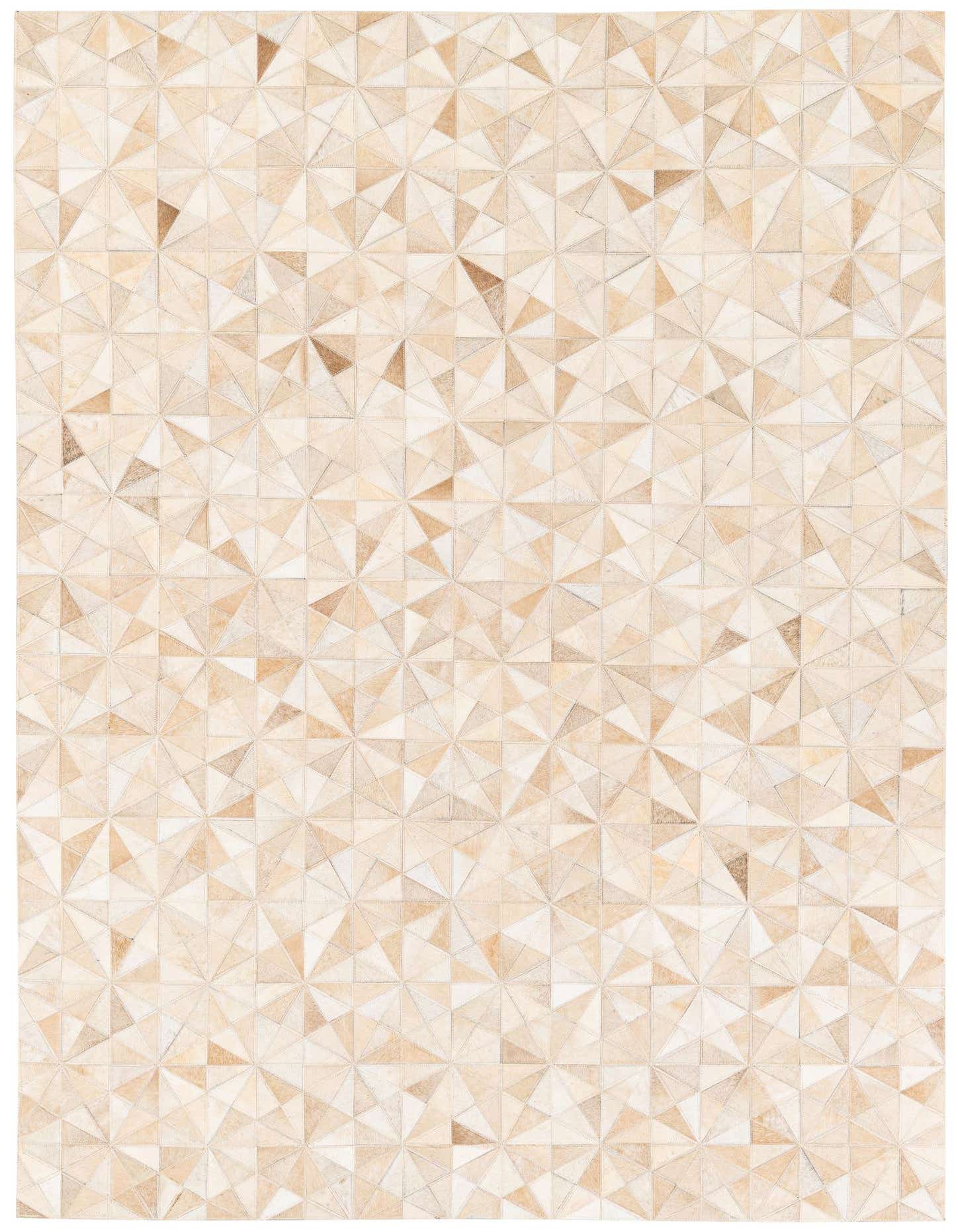 A 5x7 rectangular modern cowhide rug featuring a geometric pattern of triangles in various shades of brown, tan, and cream.