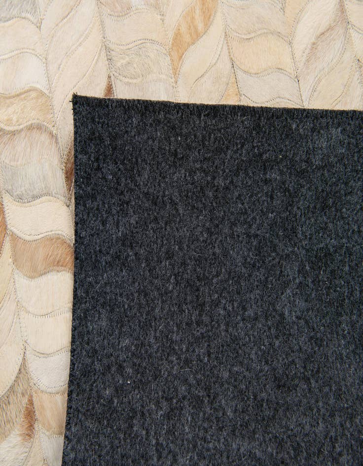 Detail image of  3' 11 x 5' 10 Cowhide Stocks Rug