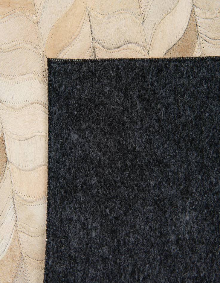 Detail image of  3' 11 x 6' Cowhide Stocks Rug