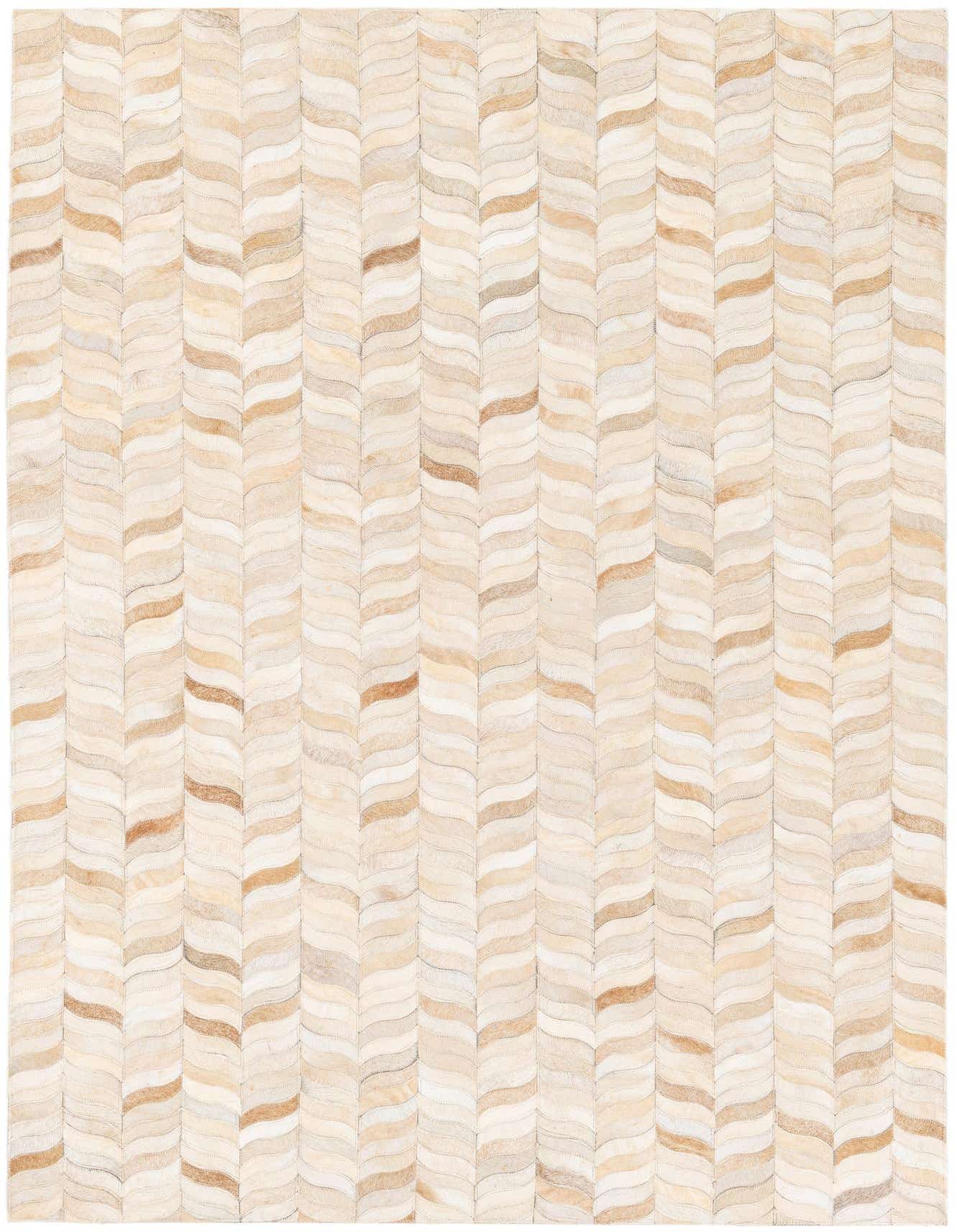 A 4x6 rectangular cowhide rug featuring a modern chevron pattern in varying shades of brown, tan, and cream.