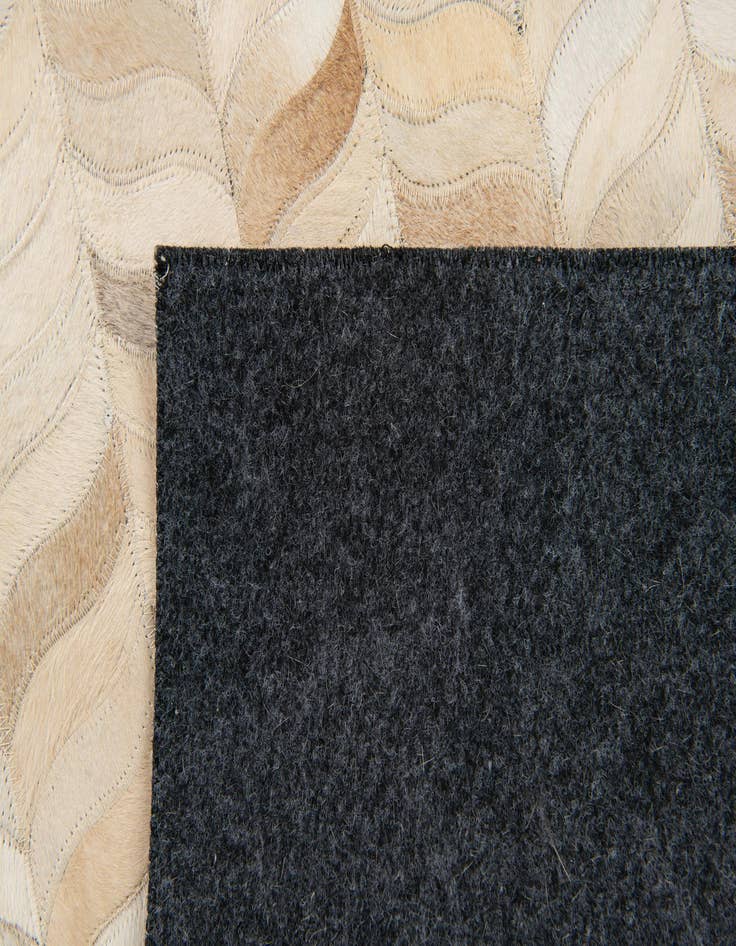 Detail image of  3' 11 x 5' 10 Cowhide Stocks Rug