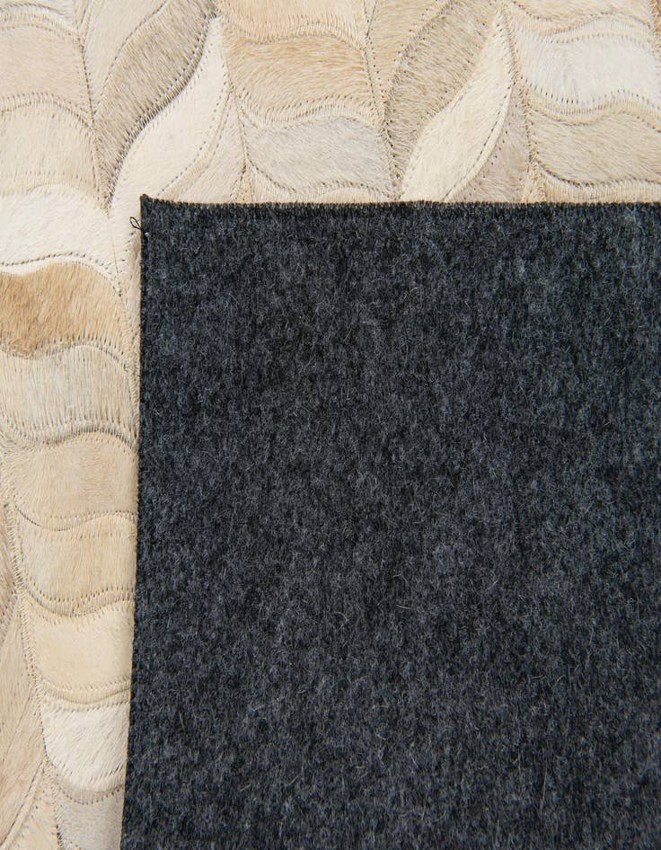 Detail image of  3' 11 x 5' 10 Cowhide Stocks Rug