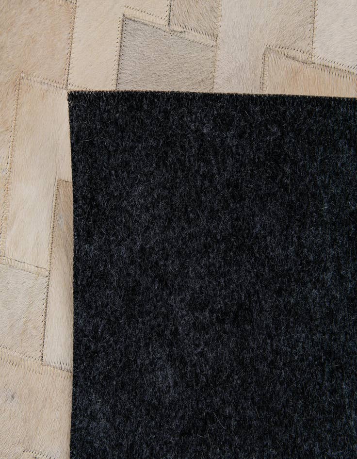 Detail image of  4' 1 x 5' 11 Cowhide Stocks Rug