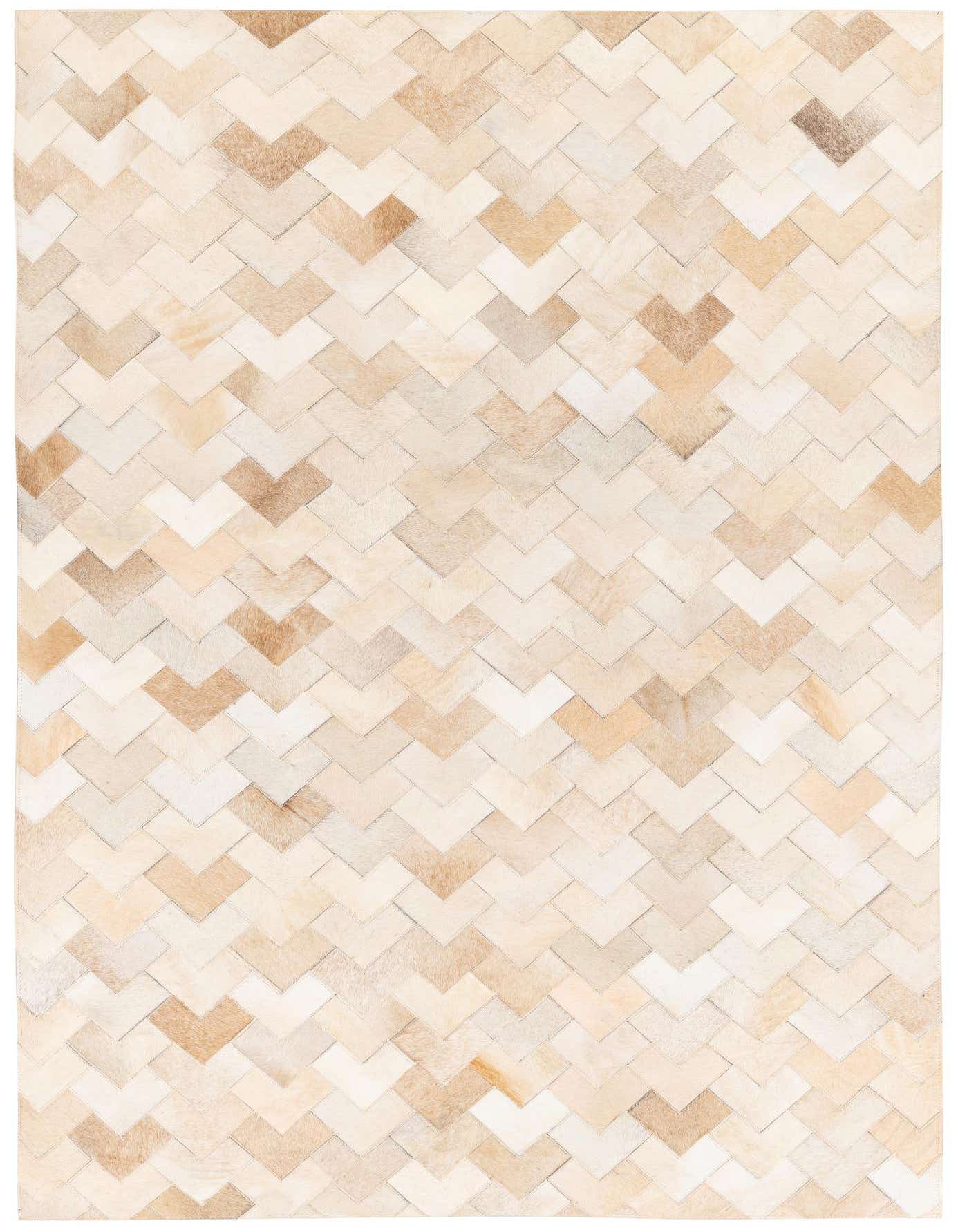 A 4x6 rectangular cowhide rug featuring a modern chevron pattern in varying shades of brown, tan, and ivory.
