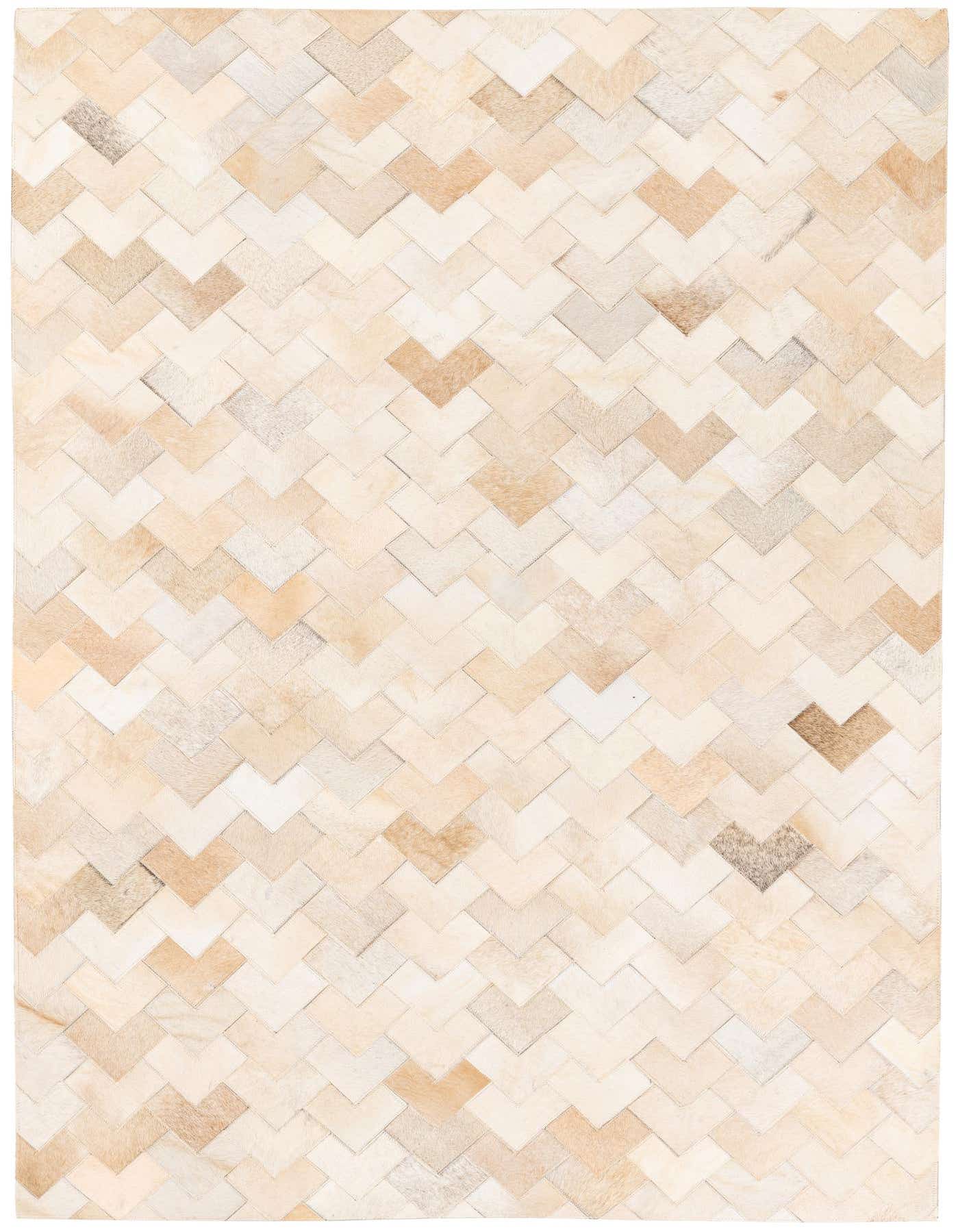 A 4x6 rectangular Cowhide Stocks rug featuring a modern chevron pattern in varying shades of brown, tan, and cream.