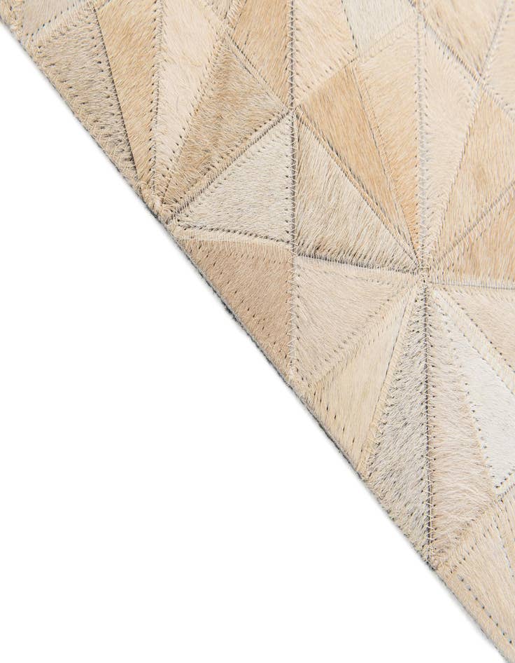 Detail image of  3' 11 x 6' Cowhide Stocks Rug