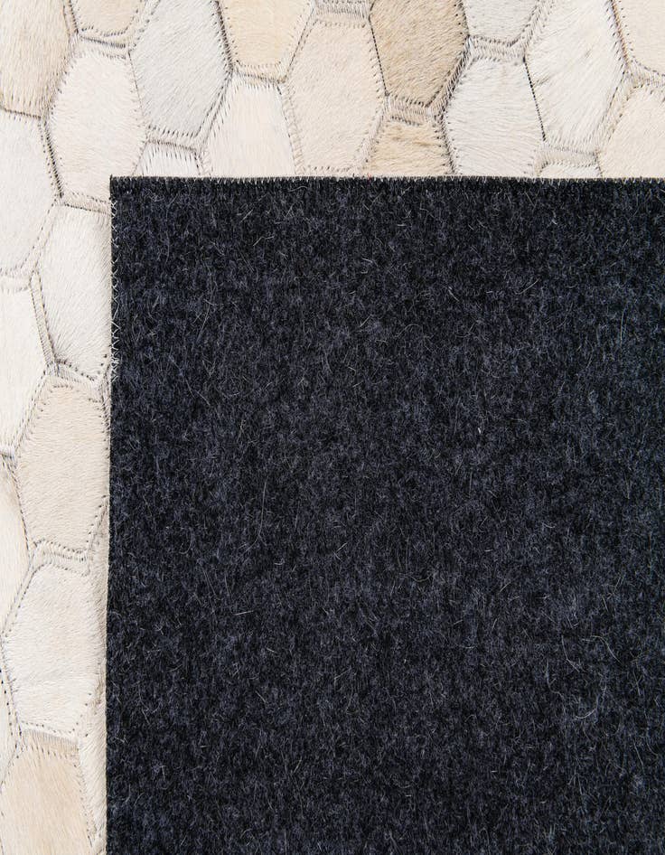Detail image of  4' 10 x 7' 9 Cowhide Stocks Rug