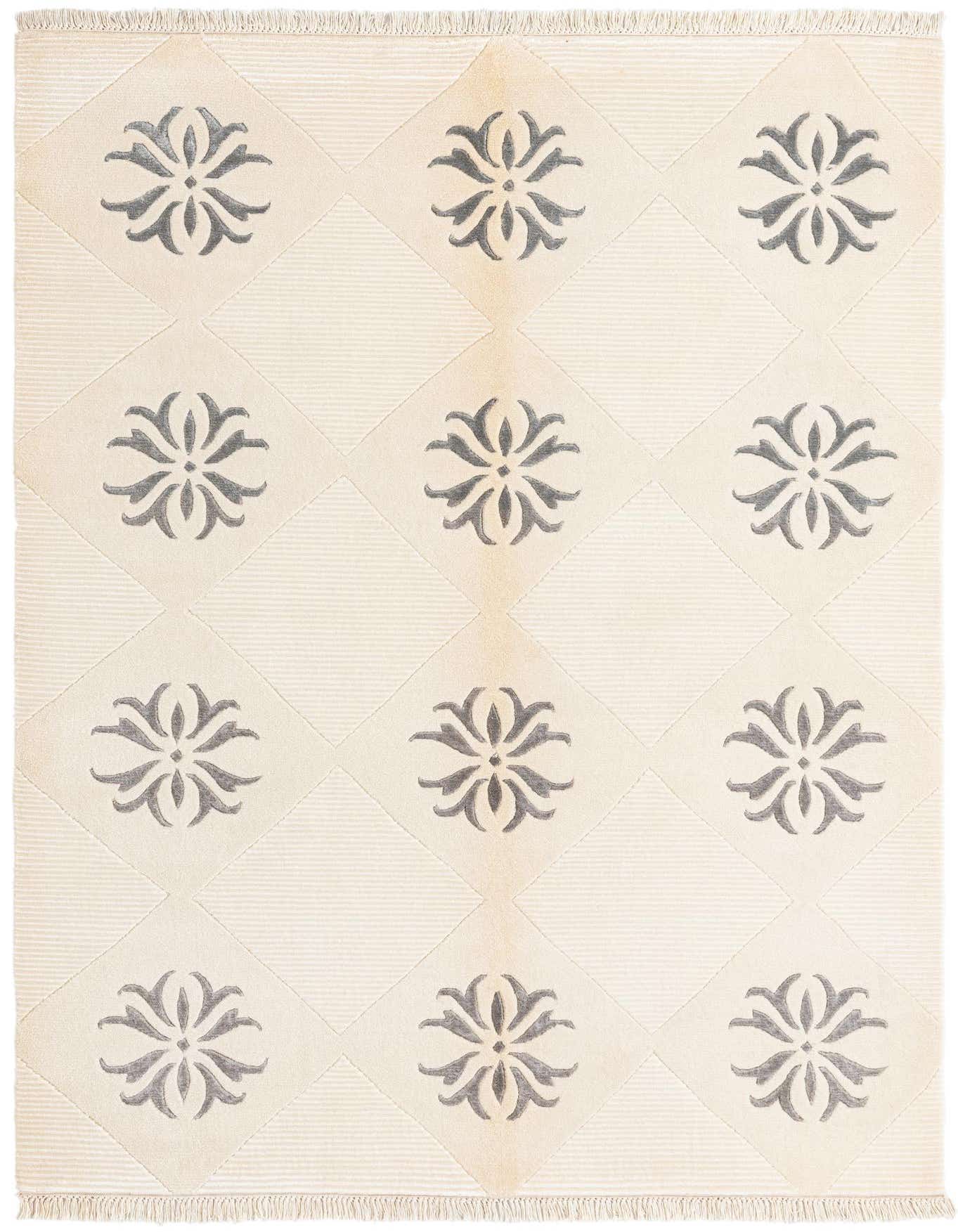 A 4x6 rectangular Darya rug with a cream background and a repeating pattern of dark brown floral medallions.