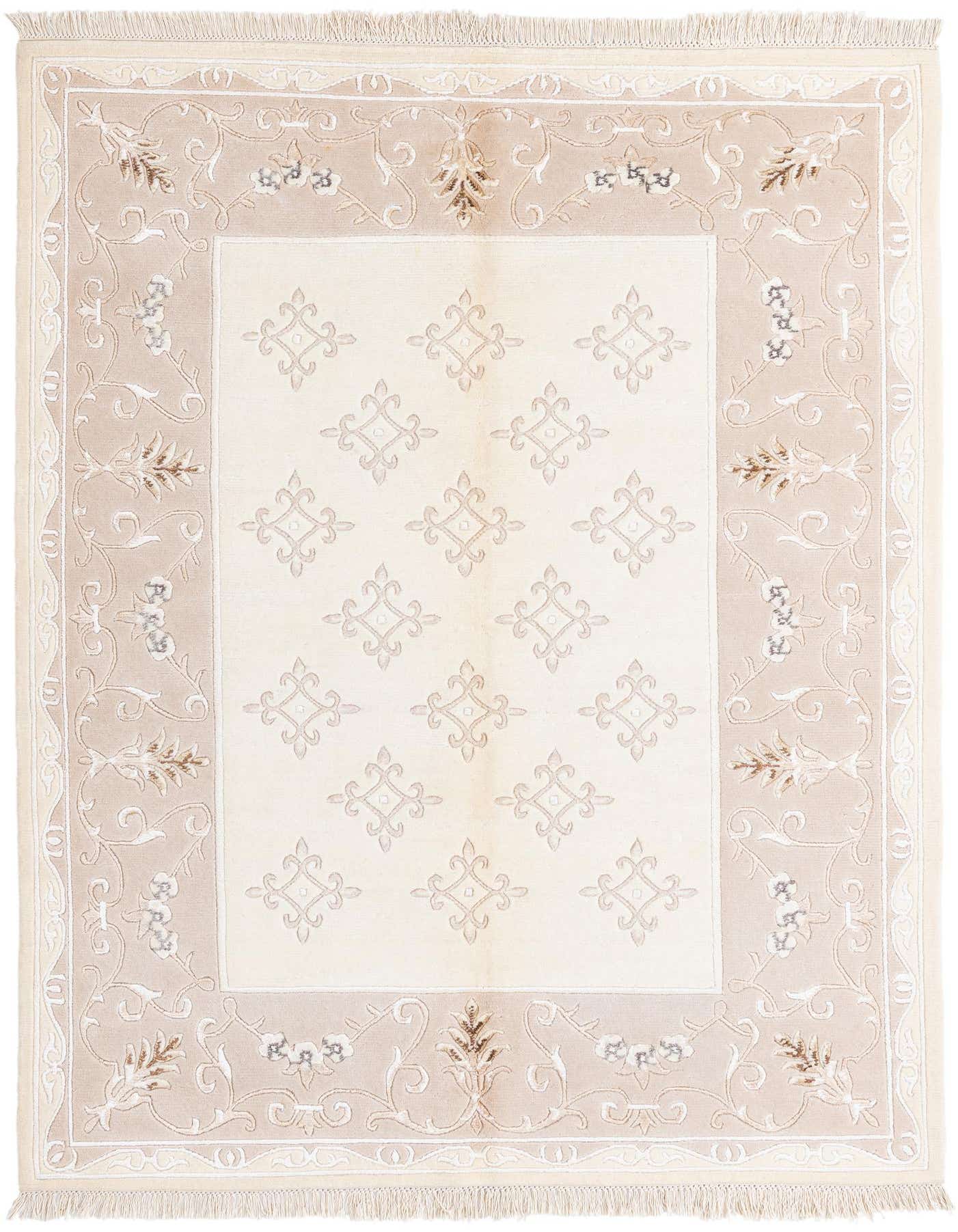 A 4x6 rectangular Darya rug with a cream center featuring tan geometric patterns, bordered by a tan frame with intricate floral and leaf designs in brown and ivory.