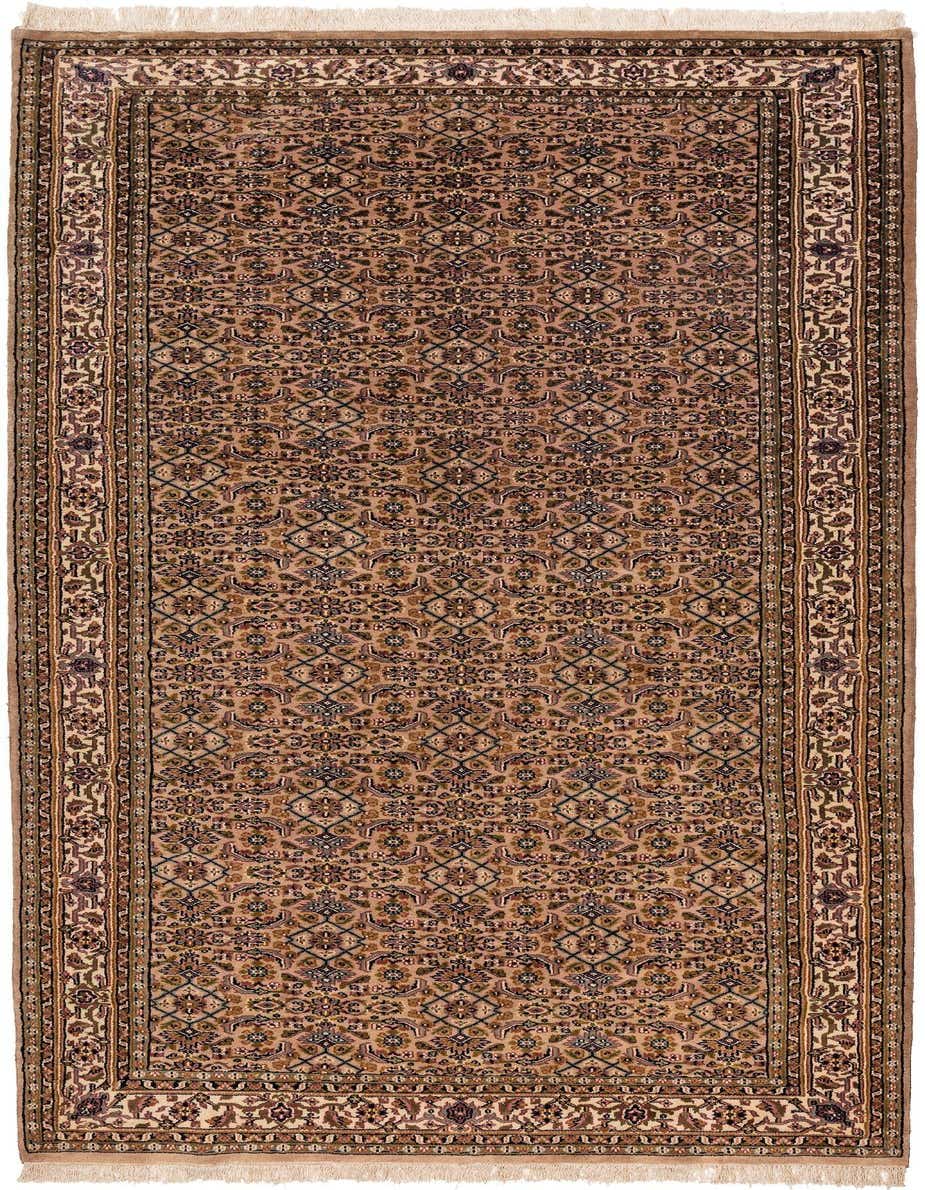 A 6x9 rectangular Feraghan wool rug with a detailed traditional pattern in browns, tans, and ivories.