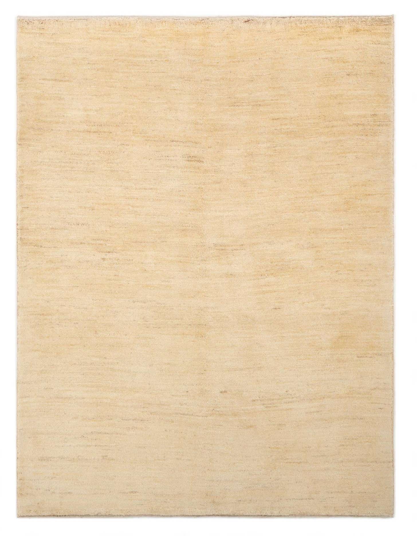 A 4x6 rectangular Gabbeh Shouli rug in varying shades of brown and tan, showcasing its plush wool texture.