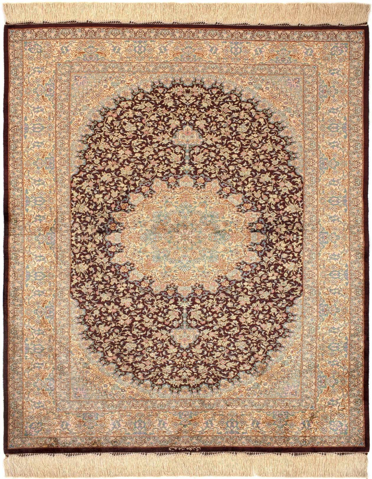 A 3x5 rectangular Ghom Silk Persian rug featuring a detailed floral medallion in rich browns and creams, with light blue accents.