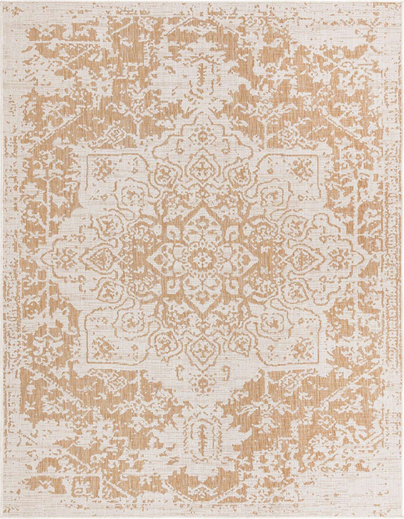 A 7x10 rectangular Jill Zarin Outdoor rug featuring a distressed brown and ivory Mediterranean medallion pattern, suitable for indoor or outdoor spaces.