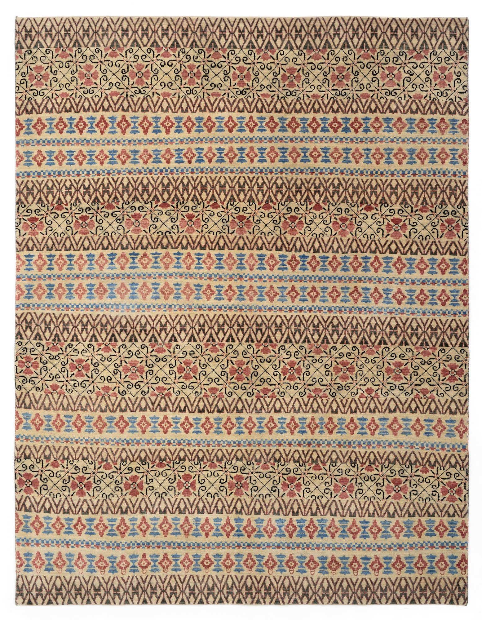 A rectangular 8x10 Kamla Persian rug featuring intricate brown, red, and blue patterns on a cream background.