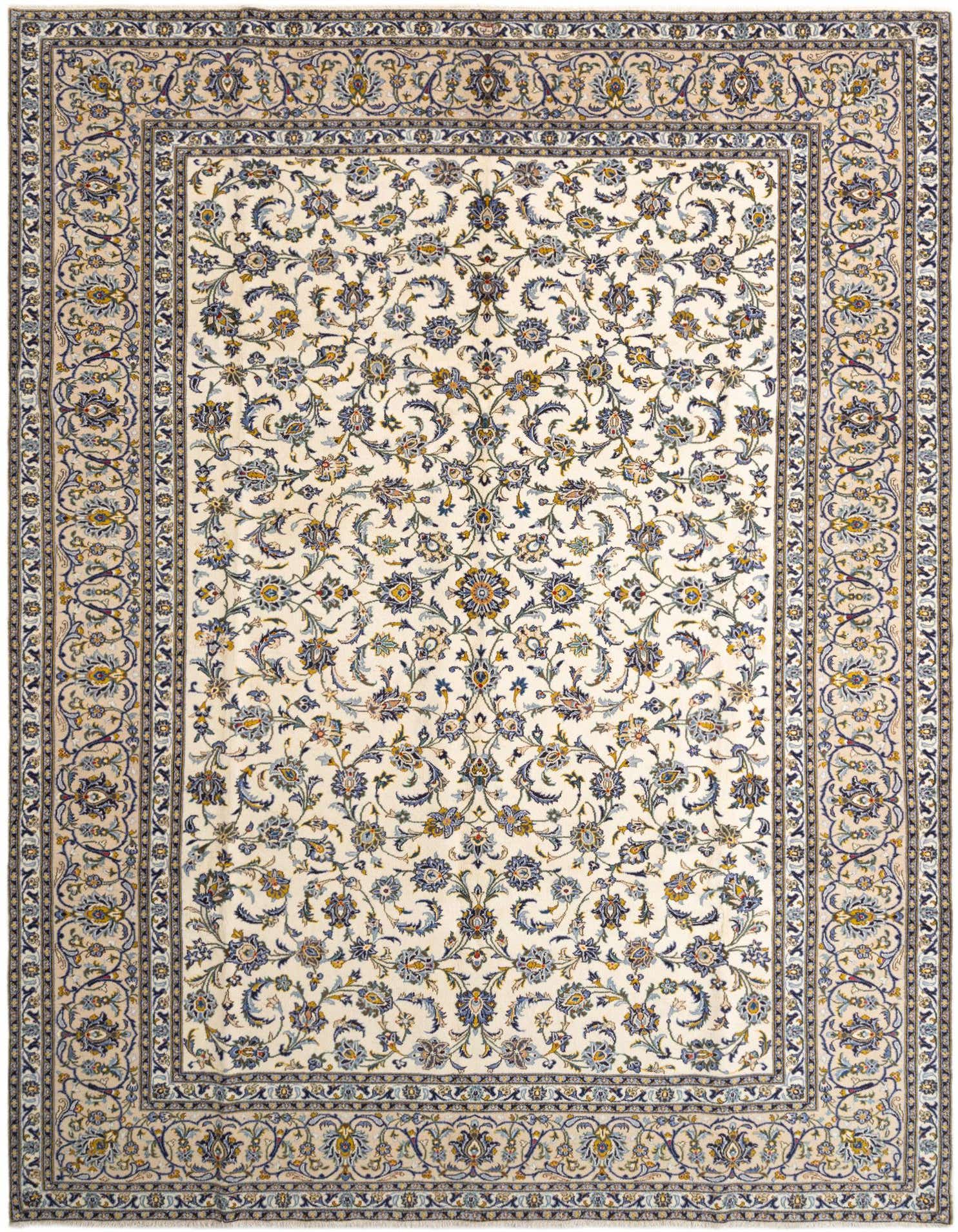 A 10x13 rectangular Kashan rug with a cream field and traditional floral patterns in blue, gold, and brown.