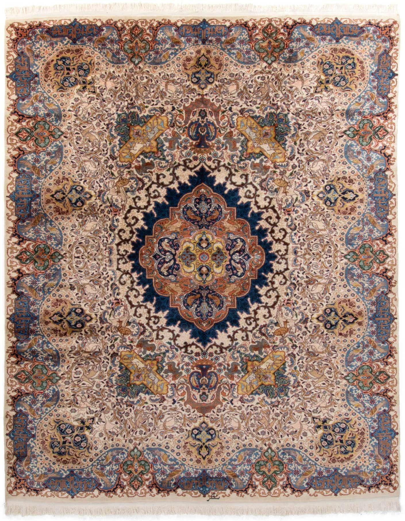A 10x13 rectangular Kashmar Persian rug featuring a detailed ivory and tan field with a central navy medallion and intricate floral motifs.