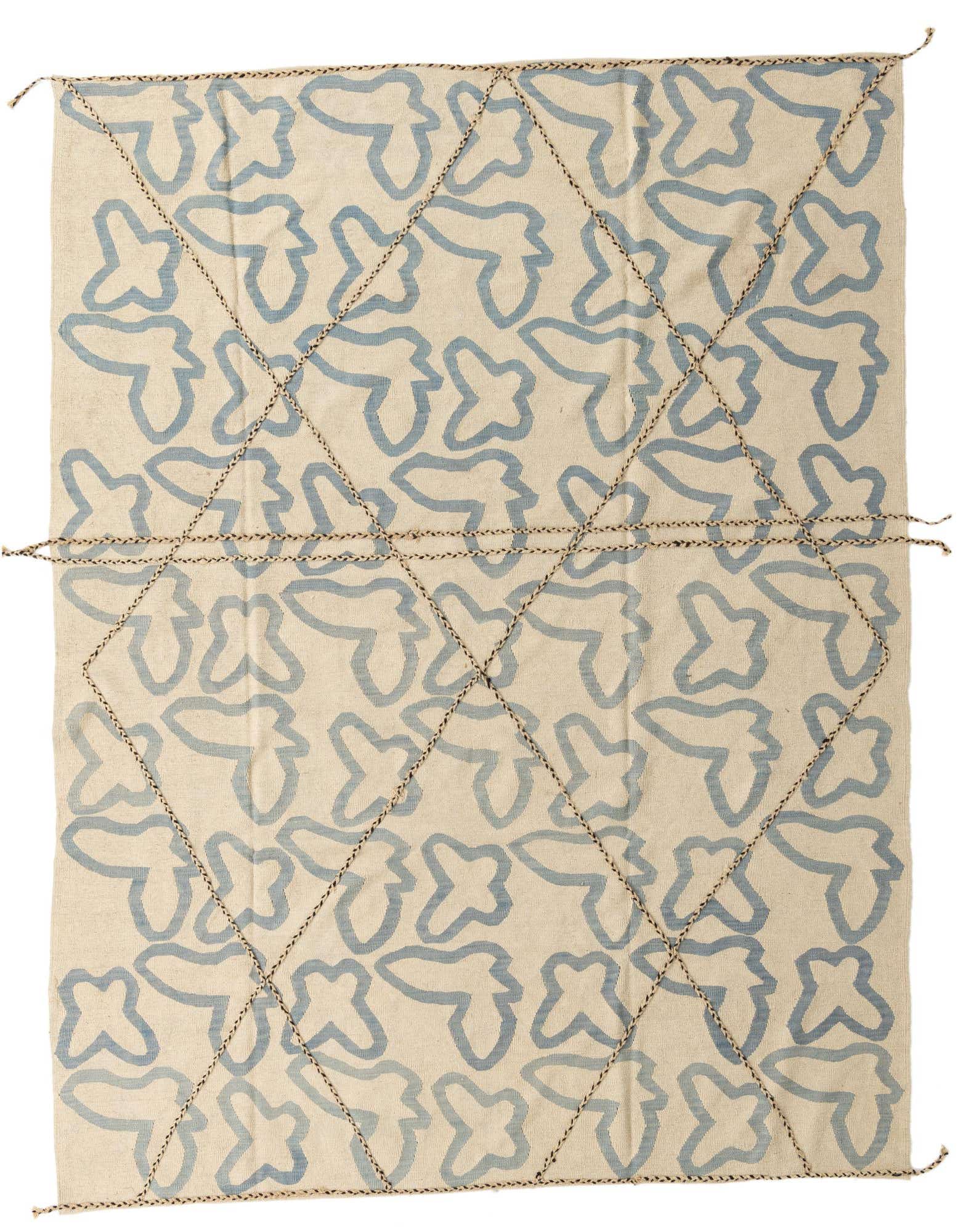 An 8x10 rectangular flatweave wool rug featuring an abstract tribal pattern in light blue on a cream background, with decorative brown braided cording forming a diamond grid.