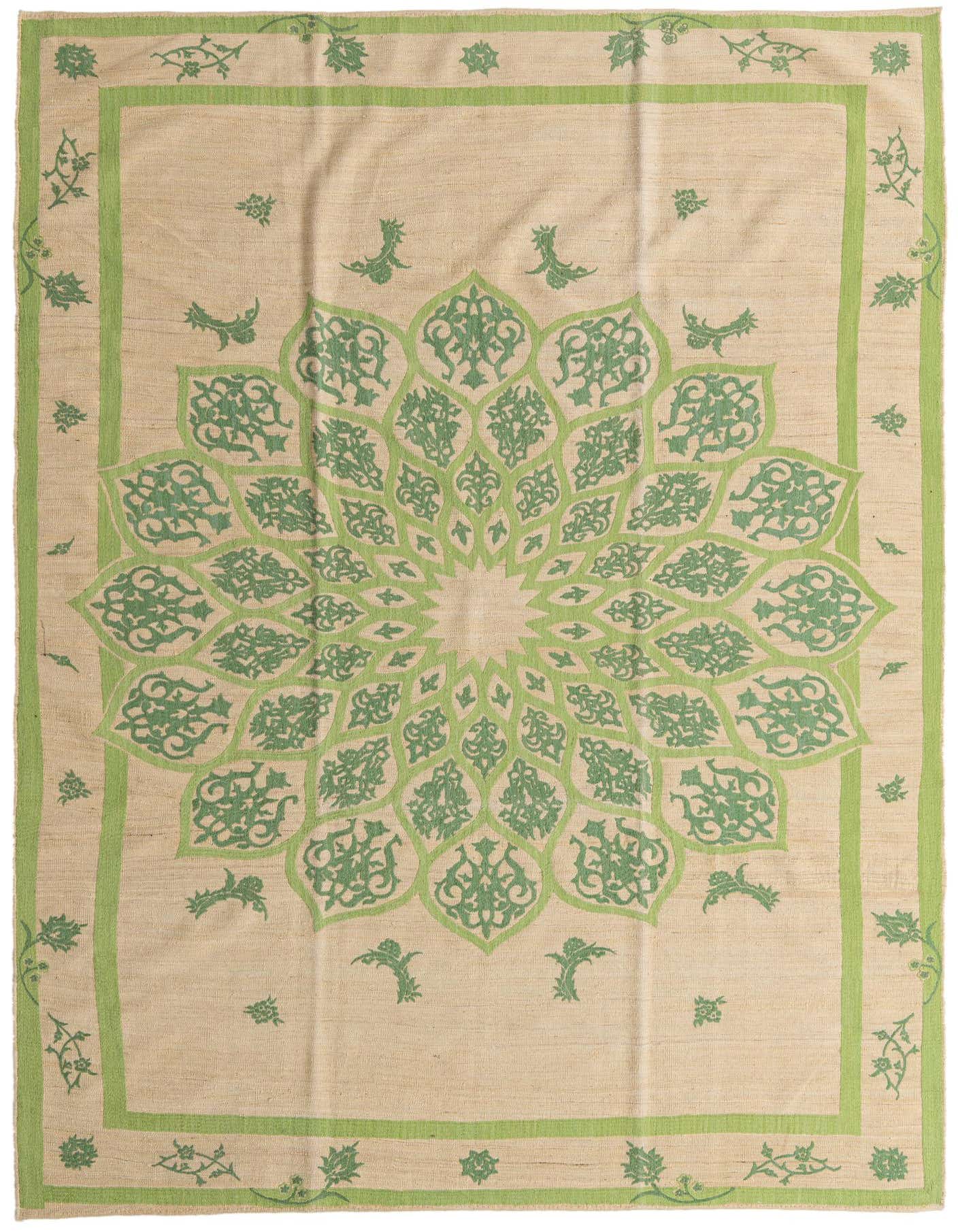A large 8x11 rectangular flatweave rug with a central green medallion pattern on a light brown and cream background.