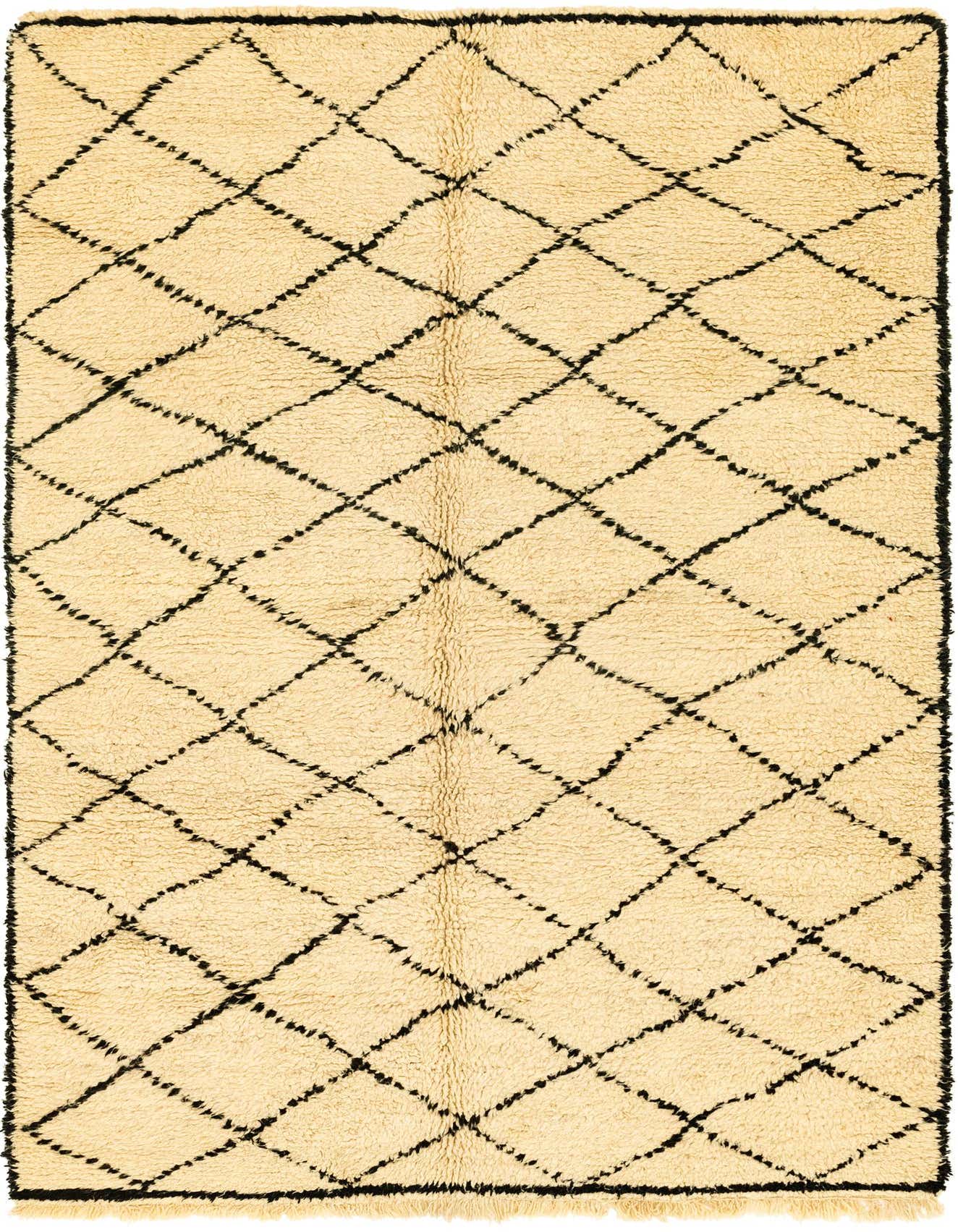 A 6x9 rectangular shag rug featuring a cream background with a black tribal diamond pattern, ideal for a living room.