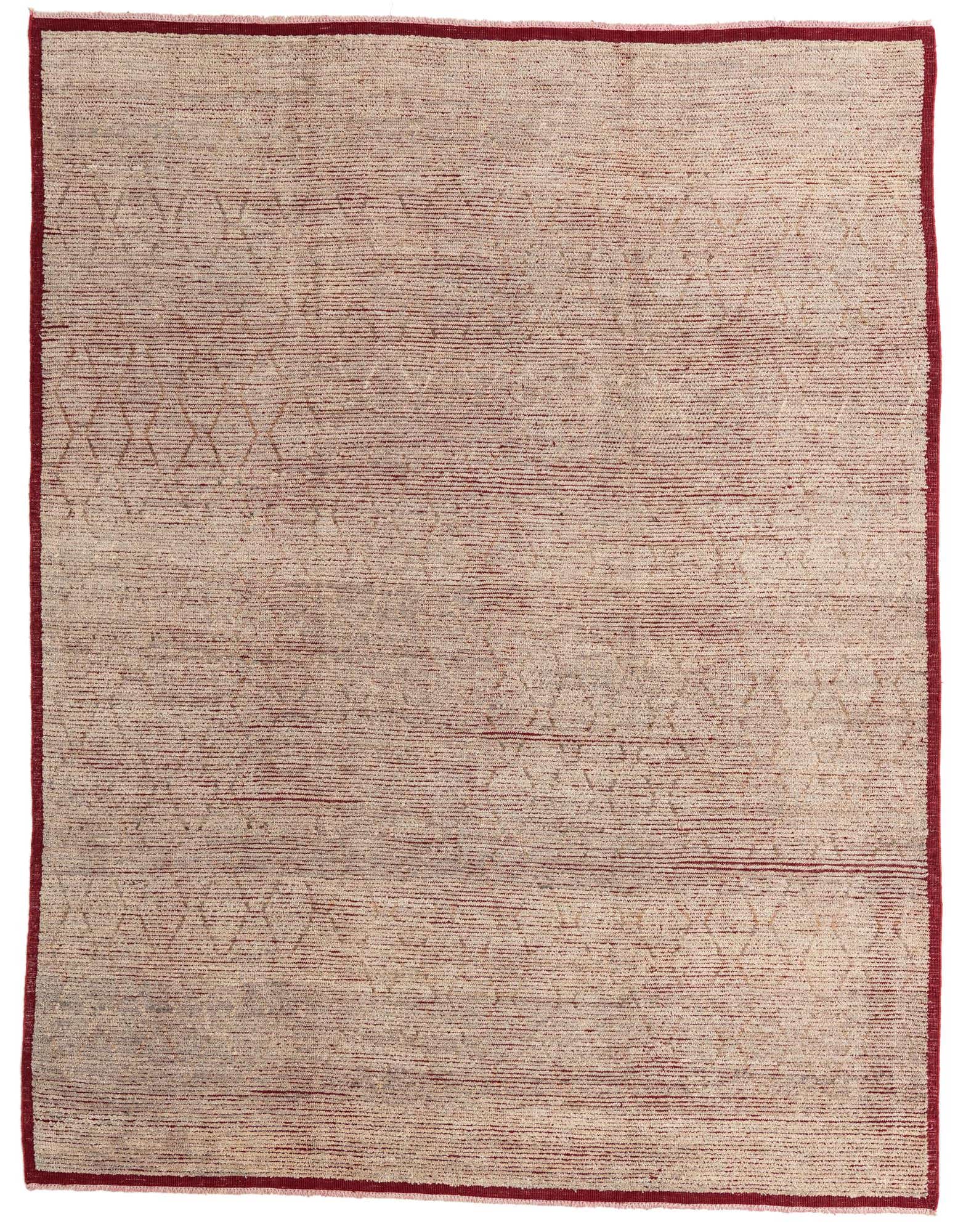 An 8x10 rectangular shag rug with a cream and tan base, featuring subtle tribal geometric patterns and a deep red border.