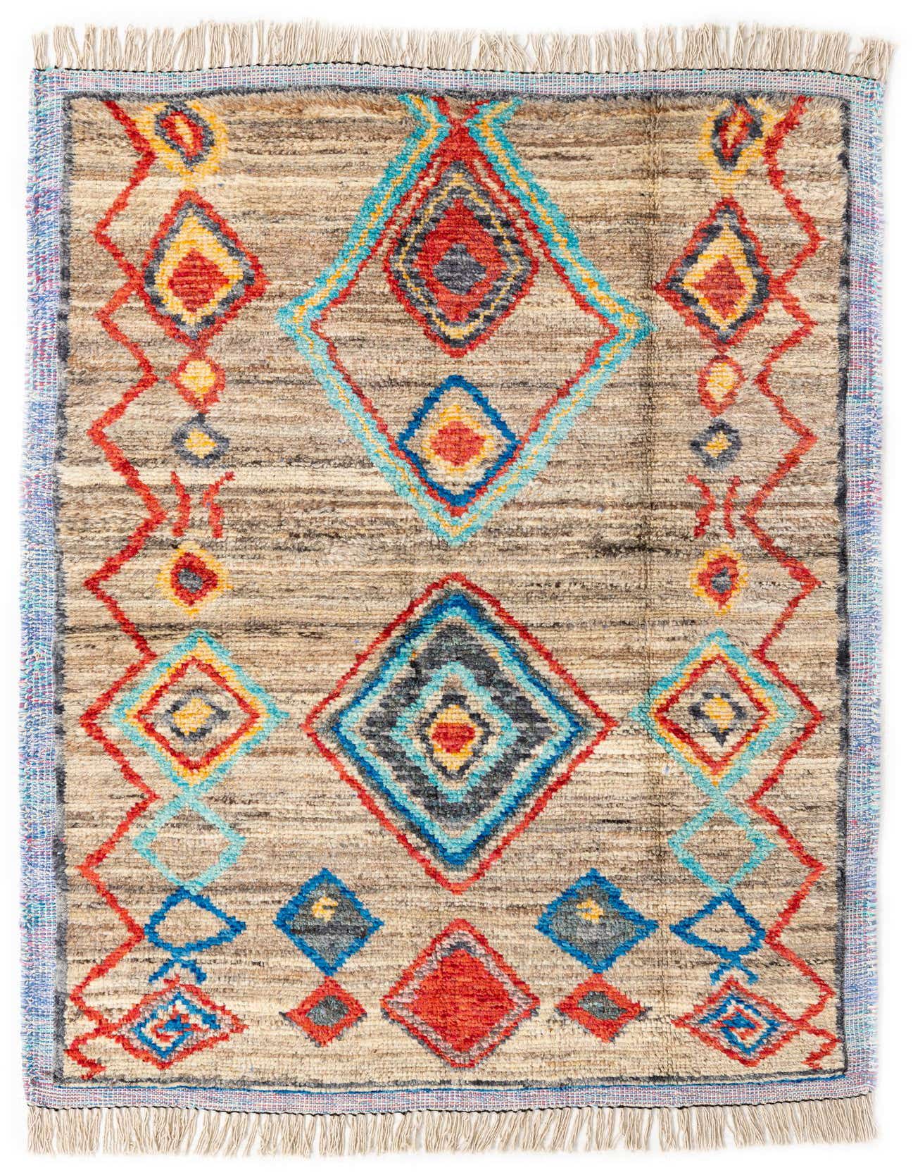 A 5x8 rectangular Moroccan shag rug with a brown and cream base, featuring colorful tribal diamond patterns in red, blue, yellow, and black, with fringed ends.