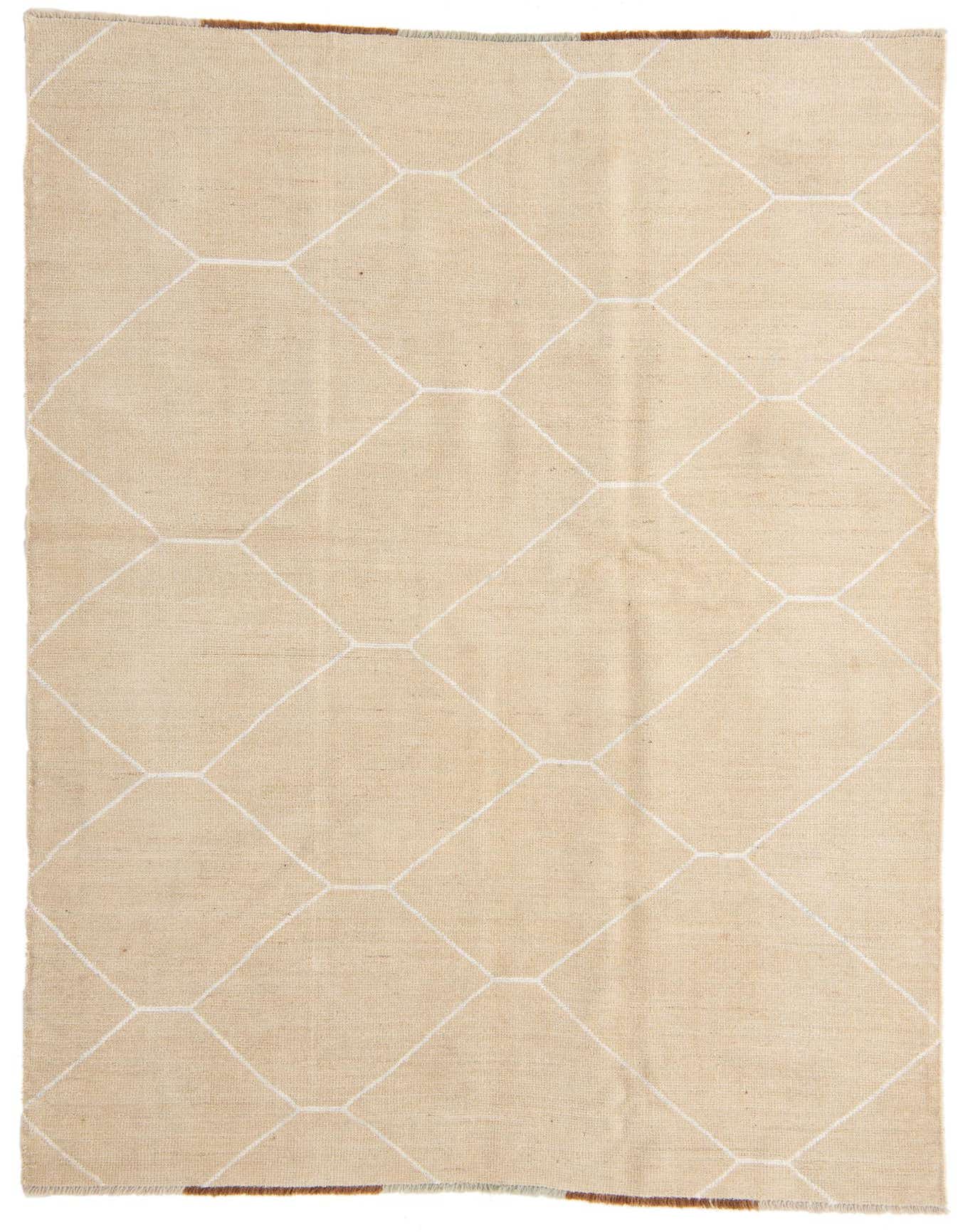 A 6x9 rectangular Moroccan shag rug in brown and ivory with a modern tribal geometric pattern.