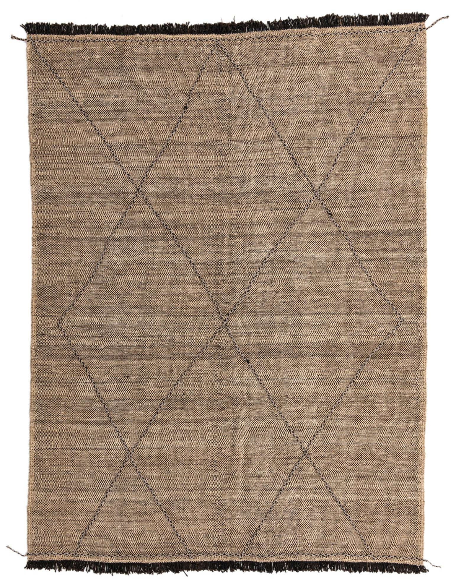 A 7x10 rectangular brown and ivory tribal wool shag rug with black diamond patterns and fringed edges.