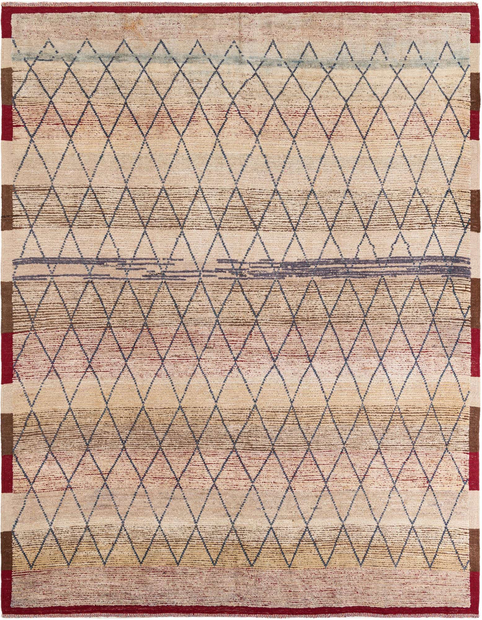 A 9x11 rectangular Moroccan shag rug with a tribal diamond pattern in browns, tans, and ivories.