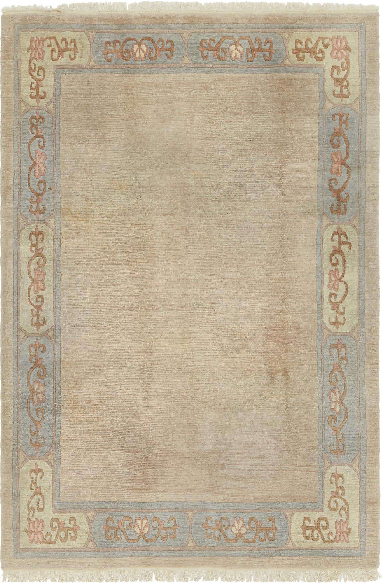 A 7x10 rectangular Nepal rug in brown and ivory, featuring a subtle modern oriental border design, ideal for a living room.