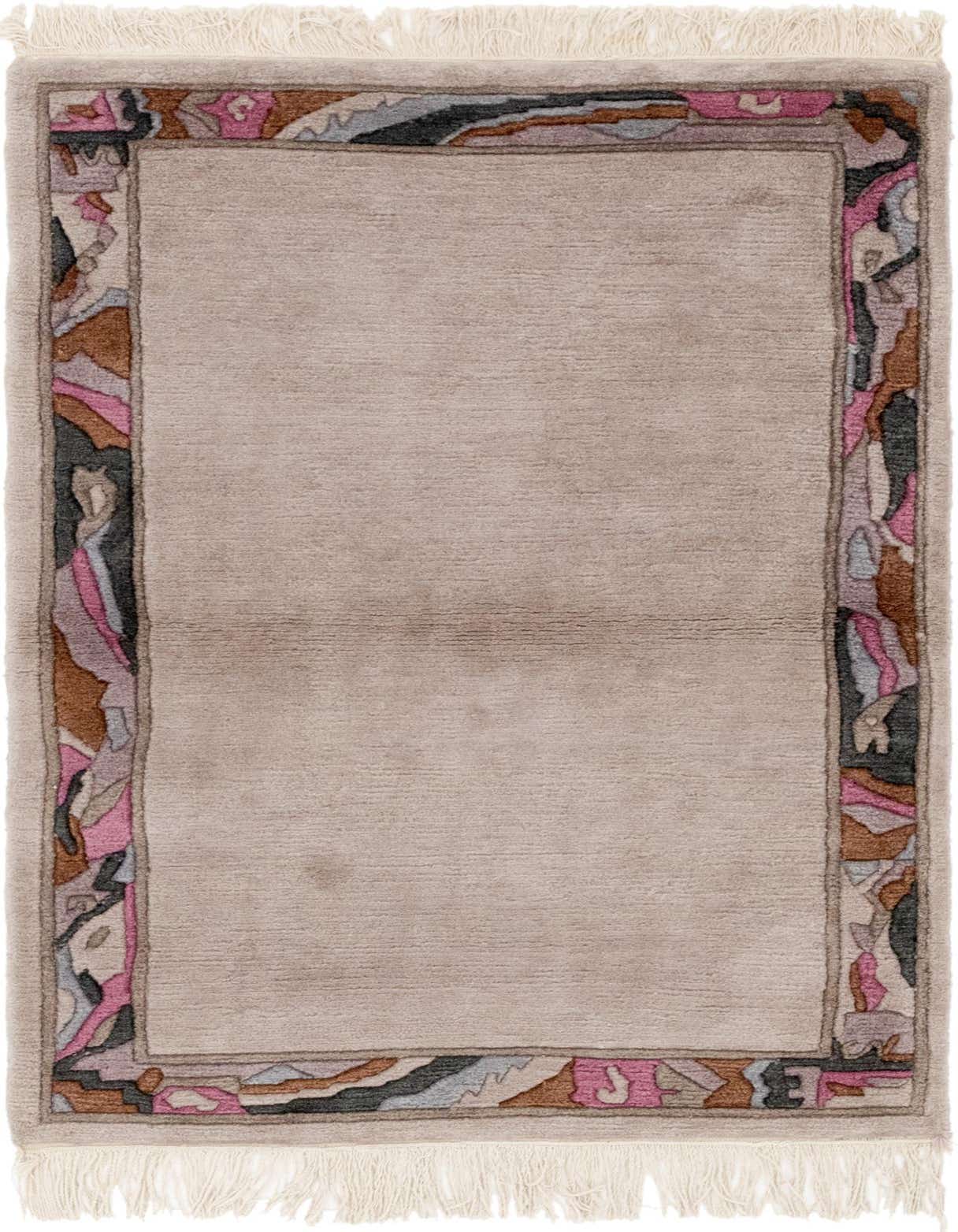 A 3x5 rectangular wool rug in brown and ivory with a high pile, featuring an abstract border design.