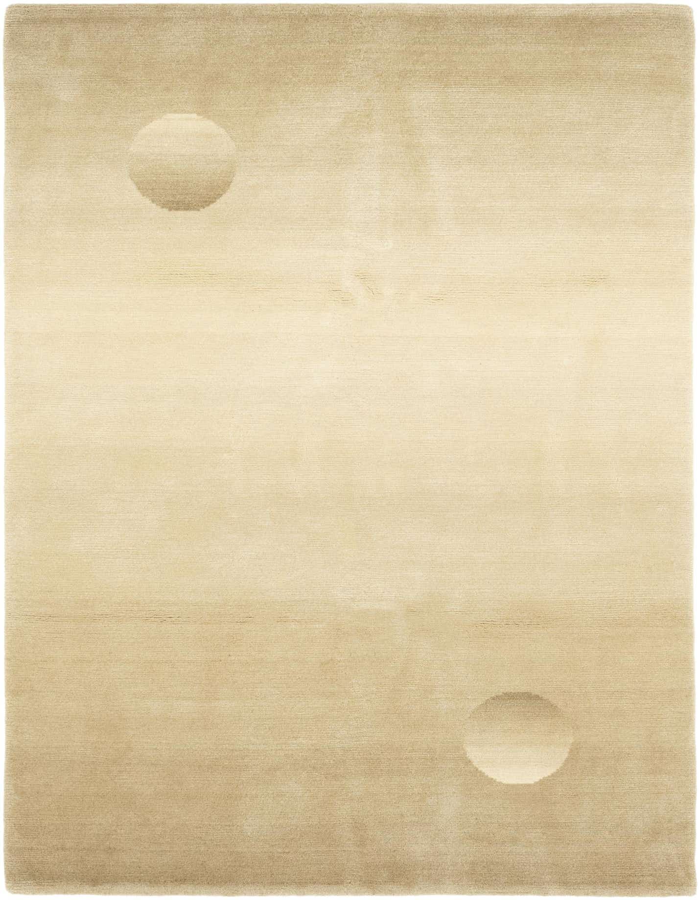 A 5x7 rectangular Nepal Collection rug in warm cream and tan wool, featuring two subtle raised circular patterns.