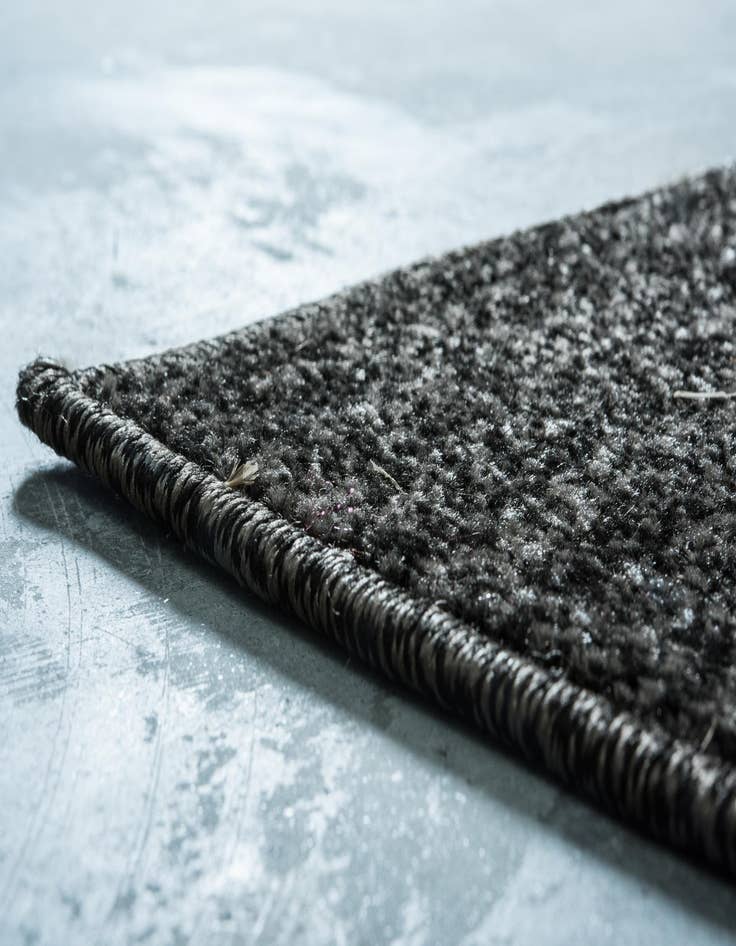 Detail image of  7' x 10'  Washable Border Indoor / Outdoor Rug