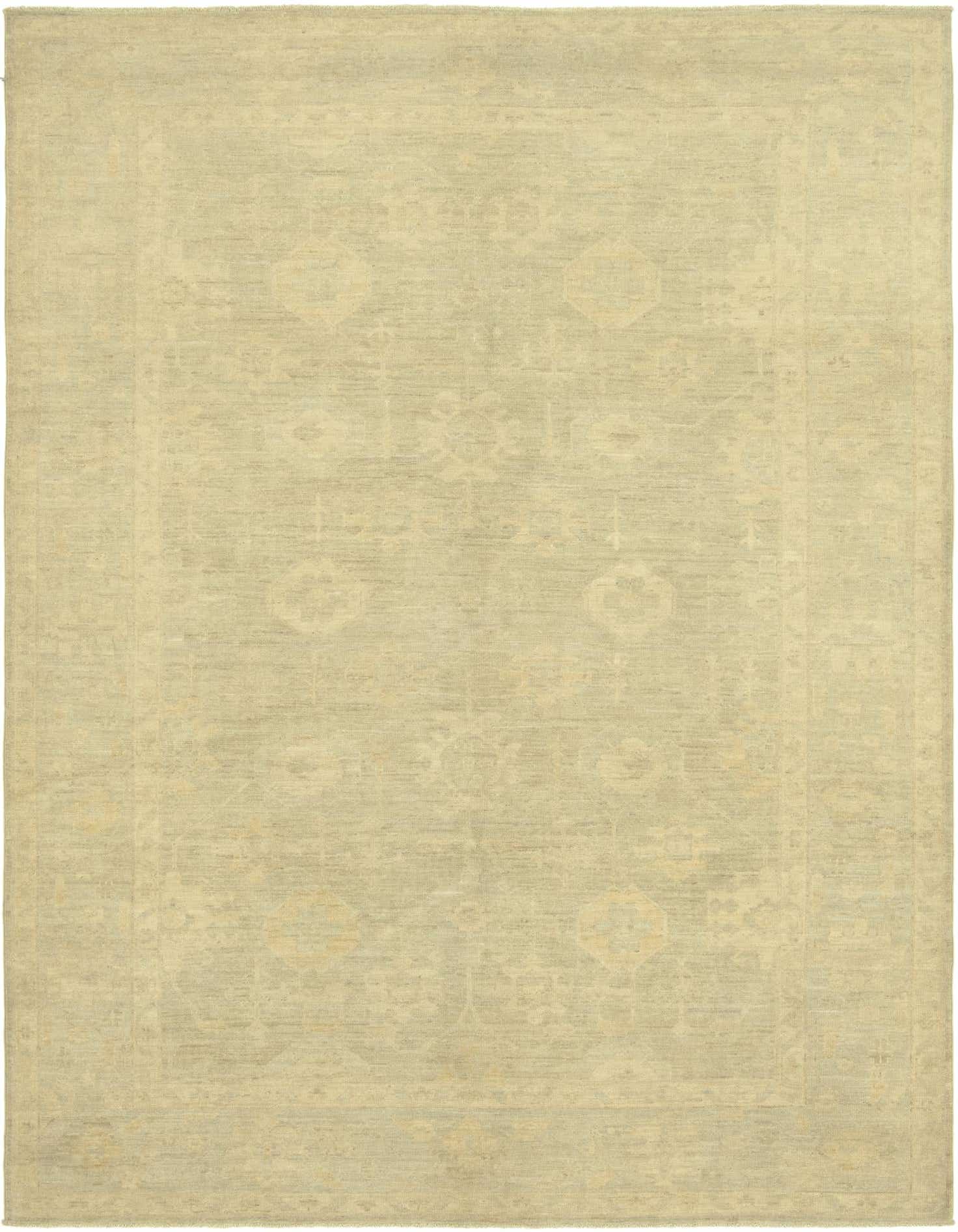 A 6x9 rectangular Over-Dyed Ziegler rug featuring a subtle traditional botanical pattern in muted browns, tans, and creams.