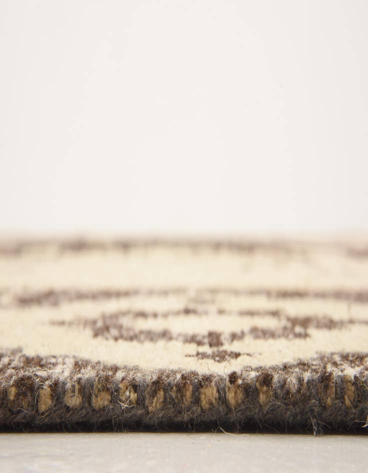 Detail image of  5' 4 x 7' 8  Hand Knotted Patchwork Wool Rug