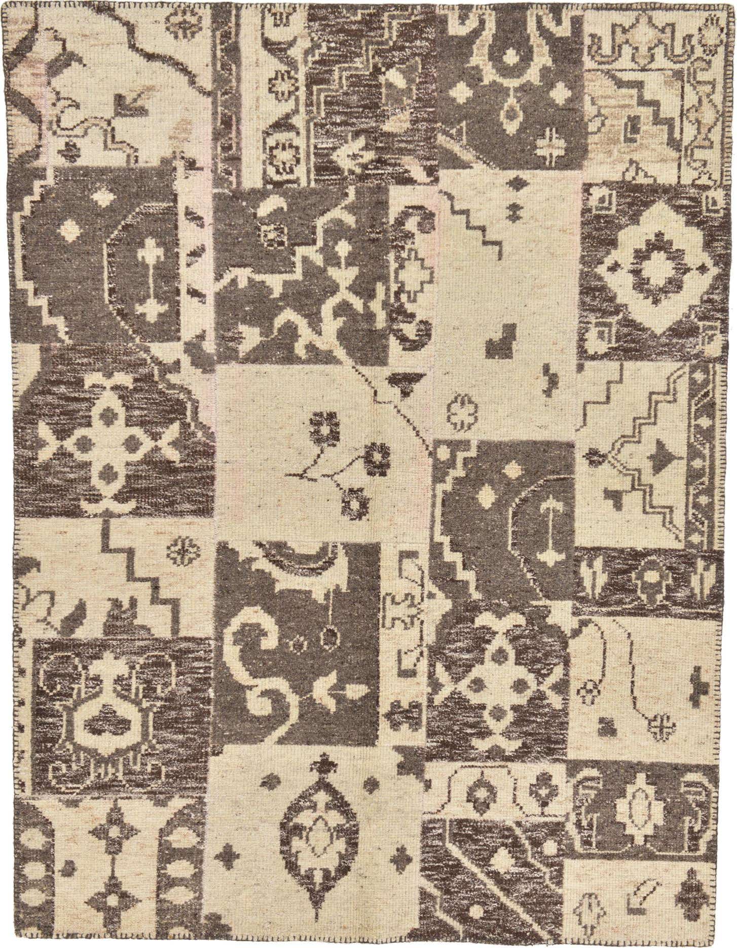 Primary image  5' 4 x 7' 8  Hand Knotted Patchwork Wool Rug