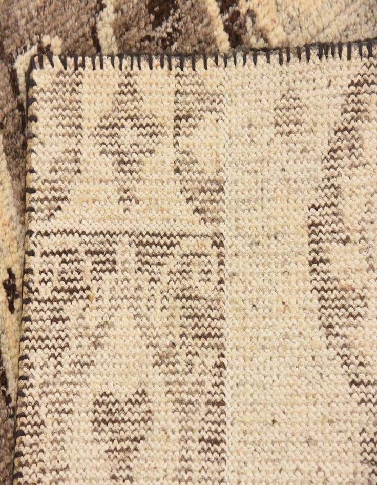 Detail image of 4' x 5' 8 Hand Knotted Patchwork Wool Rug