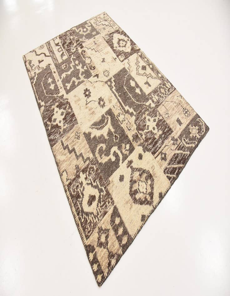 Detail image of  4' 6 x 6' 5  Hand Knotted Patchwork Wool Rug