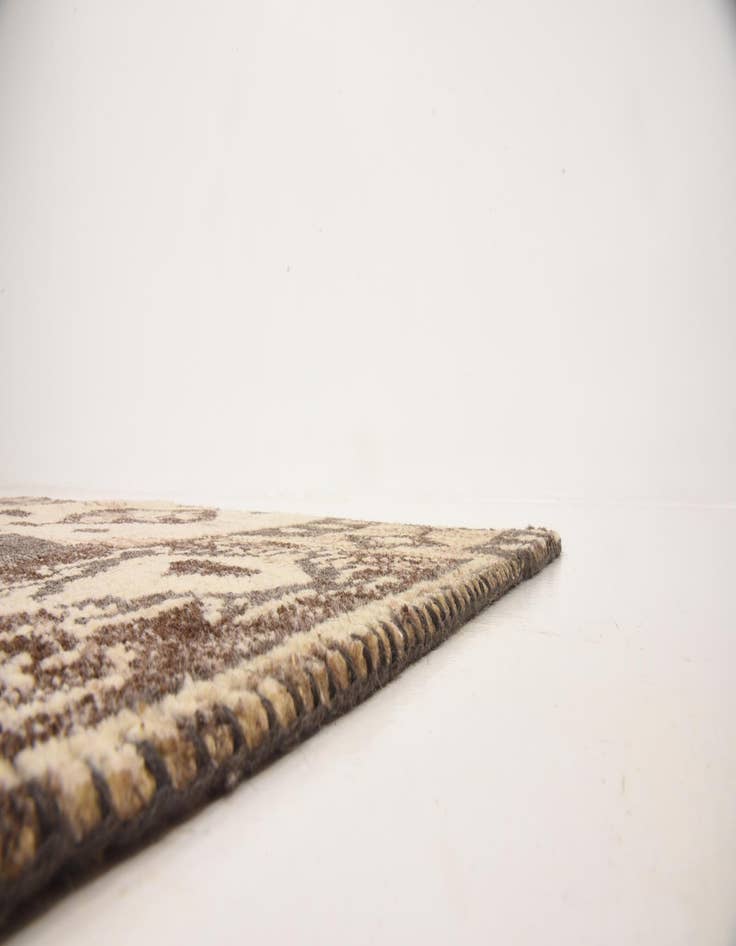 Detail image of  4' 6 x 6' 5  Hand Knotted Patchwork Wool Rug