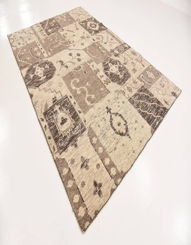 Detail image of 6' 7 x 9' 7 Hand Knotted Patchwork Wool Rug