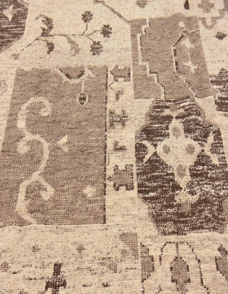 Detail image of 6' 7 x 9' 7 Hand Knotted Patchwork Wool Rug