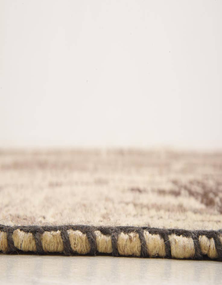 Detail image of 6' 7 x 9' 7 Hand Knotted Patchwork Wool Rug