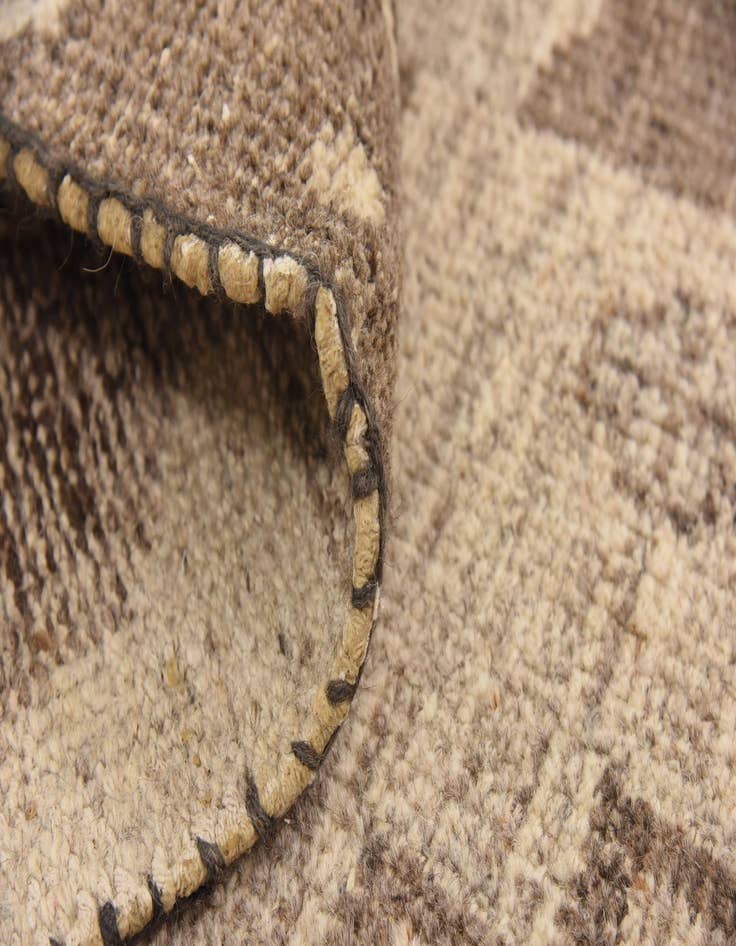 Detail image of 6' 7 x 9' 7 Hand Knotted Patchwork Wool Rug