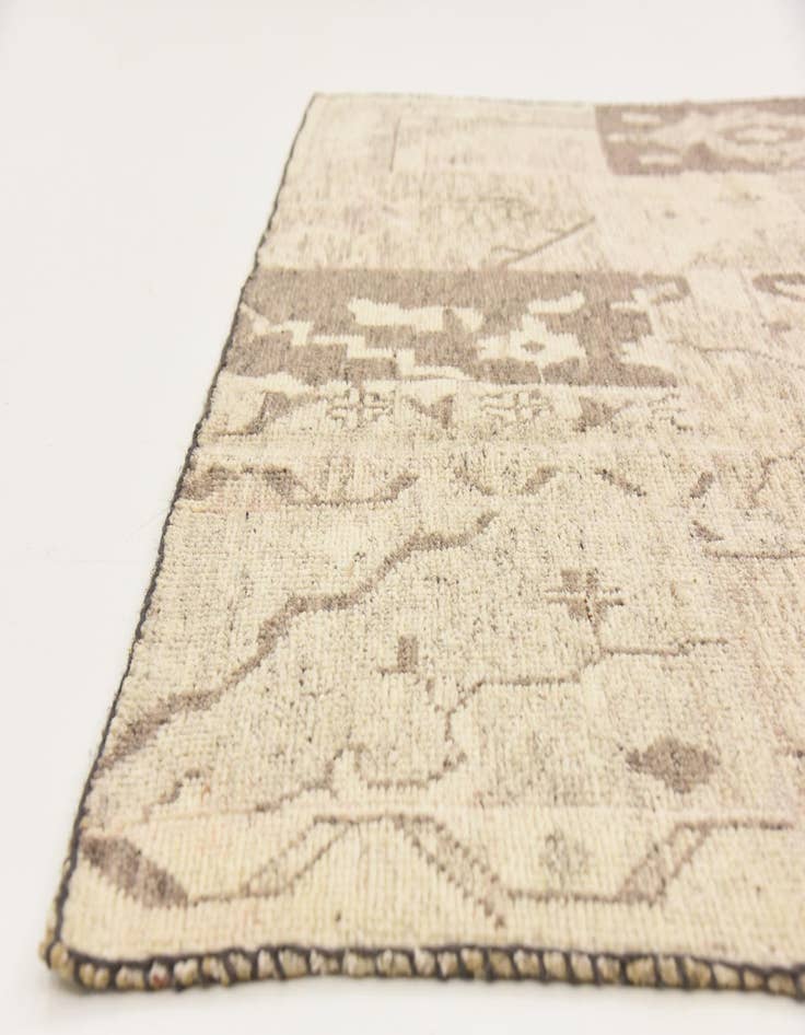 Detail image of 6' 8 x 9' 6 Hand Knotted Patchwork Wool Rug