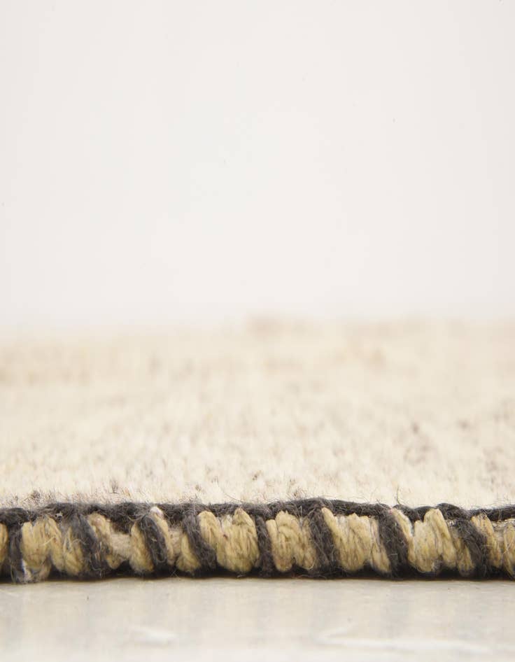 Detail image of 6' 8 x 9' 6 Hand Knotted Patchwork Wool Rug