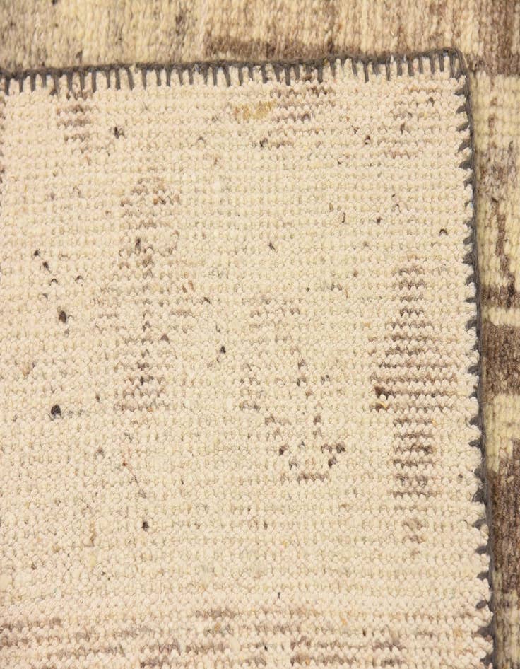 Detail image of  6' 5 x 9' 9  Hand Knotted Patchwork Wool Rug