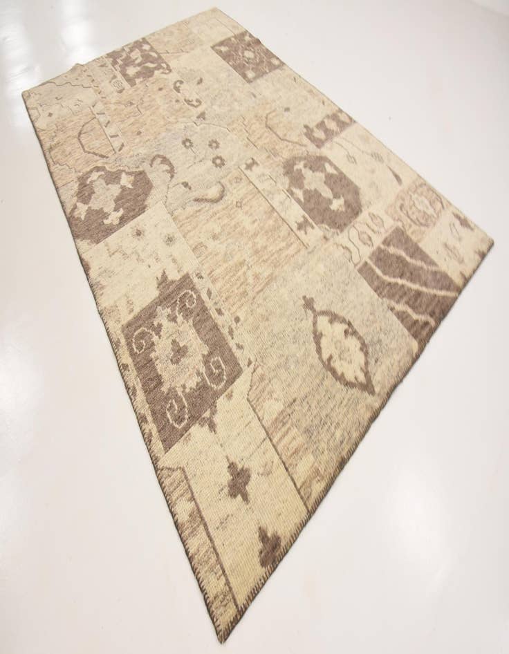 Detail image of  6' 5 x 9' 9  Hand Knotted Patchwork Wool Rug