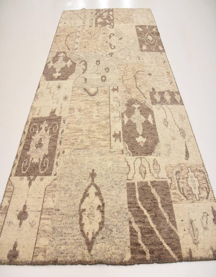 Detail image of  6' 5 x 9' 9  Hand Knotted Patchwork Wool Rug