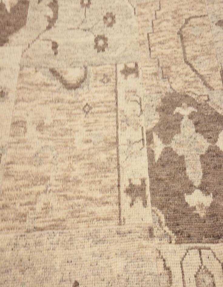 Detail image of  6' 5 x 9' 9  Hand Knotted Patchwork Wool Rug