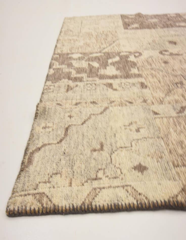 Detail image of  6' 5 x 9' 9  Hand Knotted Patchwork Wool Rug